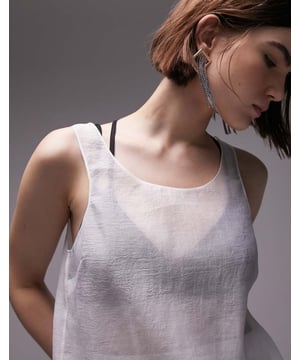 Tops by Topshop Love at first scroll Plain design Scoop neck, front and back Regular fitSold By: Asos
