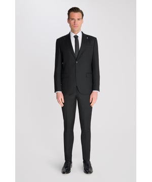 2-Piece Suit Set by Carter & Jones

Elevate your formal wardrobe with the 2-Piece Suit Set by Carter & Jones, designed for the discerning gentleman who values both style and sophistication. This suit set includes a suit jacket and trousers, each featuring those classic details that ensure you stand out in any setting.

Jacket: A 2-Button Single Breasted design with a classic cut that exudes modern elegance. The jacket is equipped with two back vents for added comfort and ease of movement. Finished with a distinctive Contrasting Lapel Pin for a touch of personality, the jacket also offers 2 Flap Pockets, a chest pocket, and multiple internal pockets for practicality. Fully lined for a premium finish.

Trousers: Pleated trousers that offer a refined silhouette with a Hook and Bar Closure, combining comfort with style for an impeccable fit.

Slim Fit.

Dry Clean Only.

Main Fabric 68% Polyester 29% Viscose 3% Elastane.

Lining 100% Polyester.

This suit comes nested, meaning the trousers will have a 6 inch difference to the jacket (eg.: Jacket - 38R | Trousers - 32R).

This 2-piece suit set is the ideal choice for weddings, business events, or any occasion that requires a sharp, sophisticated appearance. Carter & Jones delivers exceptional craftsmanship, ensuring you look your best with every wear.
