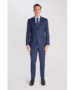 2-Piece Suit Set by Carter & Jones

Elevate your formal wardrobe with the 2-Piece Suit Set by Carter & Jones, designed for the discerning gentleman who values both style and sophistication. This suit set includes a suit jacket and trousers, each featuring those classic details that ensure you stand out in any setting.

Jacket: A 2-Button Single Breasted design with a classic cut that exudes modern elegance. The jacket is equipped with two back vents for added comfort and ease of movement. Finished with a distinctive Contrasting Lapel Pin for a touch of personality, the jacket also offers 2 Flap Pockets, a chest pocket, and multiple internal pockets for practicality. Fully lined for a premium finish.

Trousers: Pleated trousers that offer a refined silhouette with a Hook and Bar Closure, combining comfort with style for an impeccable fit.

Slim Fit.

Dry Clean Only.

Main Fabric 68% Polyester 29% Viscose 3% Elastane.

Lining 100% Polyester.

This suit comes nested, meaning the trousers will have a 6 inch difference to the jacket (eg.: Jacket - 38R | Trousers - 32R).

This 2-piece suit set is the ideal choice for weddings, business events, or any occasion that requires a sharp, sophisticated appearance. Carter & Jones delivers exceptional craftsmanship, ensuring you look your best with every wear.