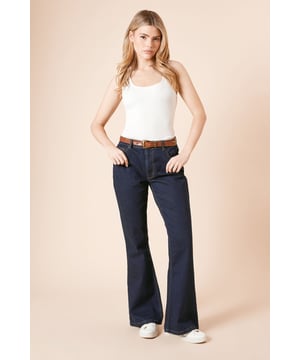 Flattering flared silhouette that gracefully widens from the knee
        Cotton-rich fabric with added stretch for all-day comfort
        Classic five-pocket design with traditional stitching detail
        Mid-rise waistband sits comfortably at the natural waist
        Versatile dark wash denim suitable for various casual occasions
    
    These Comfort Stretch Flare Jeans from Dorothy Perkins offer the perfect blend of retro charm and modern comfort. The flattering flared cut creates a balanced silhouette that works wonderfully with both fitted and relaxed tops. Style them as seen with a simple white vest and trainers for weekend brunches with the girls, or dress them up with a floaty blouse and ankle boots for family gatherings. The stretch-enhanced cotton fabric moves with you throughout the day, making these jeans ideal for shopping trips or casual coffee dates. The timeless dark wash ensures versatility in your wardrobe, while the classic pocket detailing maintains that authentic denim look. Perfect for the woman who appreciates contemporary style with practical comfort for her busy lifestyle.