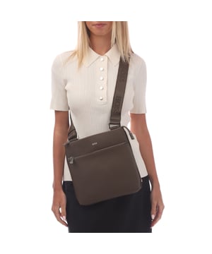 Regenerated leather with elegant  smooth look and firm handfeelFront zip pocket  adjustable shoulder strap.25 0 cm x 2 5 cm x 24 0 cm
