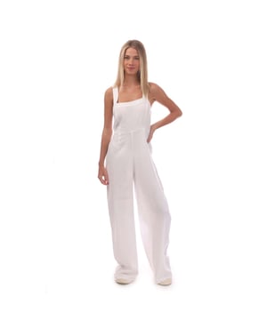 Women's Nobodys Child Maisi Linen Beach Jumpsuit. This cream jumpsuit is the dream. With a shirred back, guaranteeing a great fit. Two thick straps crossover at the back before falling to an effortless wide leg cut. Swing a straw bag over your arm and go.- Thick straps.- Pockets.- Shirred back for comfort.- Concealed zip fastening.- Wide leg cut that skims the body. Material: 55% Linen, 45% Ecovero™ Viscose. Ref: P240486CRM.