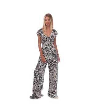 Women's Nobodys Child Suki Floral Flutter Jumpsuit. So 70s, so now. In black and white florals made entirely from responsible viscose, this stylish jumpsuit comes ruffled with a flouncy collar designed to float across your shoulders. A fitted waistline pulls you in before kicking out effortlessly to a pair of wide trousers. The fact Suki’s as pretty from the front as she is from the back isn’t to be overlooked. Team yours with barely-there sandals.- V-neck.- Fluted sleeves.- Fitted waist.- Bow back detail.- Wide leg cut that skims the body. Material: 100% Ecovero™ Viscose. Ref: P240321MLT.