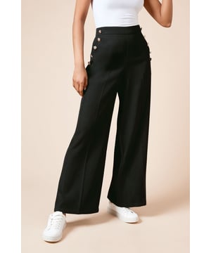 Wide leg silhouette for a relaxed, comfortable fit
        Military-inspired button detail along the waistband
        High-waisted design for a flattering shape
        Smooth woven fabric with a touch of stretch
        Versatile length suitable for various heights
    
    Make a stylish statement with these Dorothy Perkins Petite Military Button Detail Wide Leg Trousers. Perfect for the fashion-forward woman in her 30s who appreciates on-trend pieces with a modest twist. The wide-leg silhouette offers both comfort and sophistication, ideal for a variety of casual occasions. Style these trousers with a fitted white top and trainers for a chic brunch look, or pair with a floaty blouse and sandals for a relaxed family gathering. The high waist and button detailing add a touch of military-inspired flair, making these trousers a versatile addition to your wardrobe. Whether you're meeting friends for coffee or attending a baby shower, these trousers will keep you looking effortlessly stylish while maintaining comfort throughout the day.
