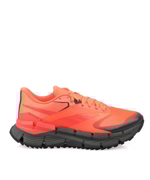 Reebok FloatZig Adventure 1 Trainers in orange black.- Textile upper.- Lace closure.- Floatride Energy Foam.- Textile lining.- High traction rubber outsole.- Ref.: 100212127