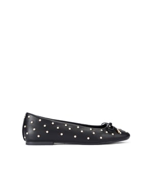 This Carvela Arianna ballet flat is crafted from a black leather alternative that is embellished with faux pearl studs. There is a black bow on the front of the toe.