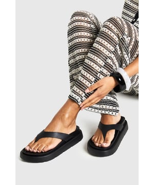 We'll make sure your shoes keep you one stylish step ahead of the crowdWhether you're keeping it simple in sliders, living the high life in heels or joining the fash pack in flatforms, you'll be heading to shoe heaven with our fashion-forward footwear collection. Boots are your day-to-night bestfriend, giving a floral dress&nbsp;that tough twist - add a biker jacket for even more attitude. Find your summer feet in jelly sandals and enjoy balmy nights in block heels.