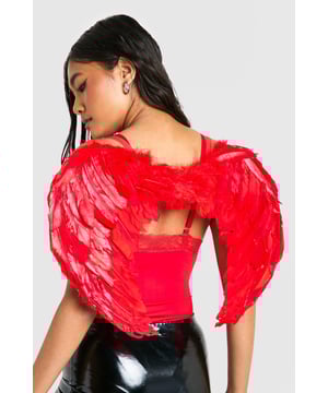 Oversized feather wings for a dramatic effect
        Adjustable straps for secure and comfortable wear
        Textured feather design for a realistic look
        Lightweight construction for ease of movement
        Versatile accessory for various costume themes
    
    Transform your look with these striking oversized feather wings, perfect for adding a touch of fantasy to your Halloween ensemble or themed party outfit. The wings feature a textured feather design that creates a lifelike appearance, while the oversized silhouette ensures you'll make a grand entrance wherever you go. Easily secured with adjustable straps, these wings are designed for comfort and wearability throughout your event. Style them with a sleek, form-fitting outfit to really let the wings take centre stage - try pairing with a black mini dress and statement boots for a bold, edgy look. Whether you're channelling a dark angel, a mythical creature, or simply want to add a dramatic flair to your costume, these versatile wings are sure to turn heads and spark conversation at any gathering.