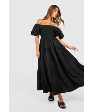 Hit refresh on your dress collection with a new-in smock dress. The much-loved 1920s style is back for the new season, with its breezy silhouette and frill detailing. A women's smock dress is the perfect transitional piece that looks unreal every season. Go from the office to out-out in a black smock dress, pair it with some killer heels and you're good to go. Spend your summer days in a dreamy tiered smock dress - the floaty, free-moving fabric is perfect for staying cool. From feminine florals to statement prints, this loose-fitting dress is just what you need. Shop everything from timeless white smock dresses to trending gingham styles, on boohoo.Style: Smock DressFabric: Woven CrepeLength: MidaxiSleeve Length: Short Sleeve