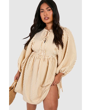 Capture your everyday style with this plus size smock dress from our updated collection. Featuring a lightweight, breezy fabric in a 1920s style, this loose fitting, free moving dress is made with extra fabric for the perfect fit. Loved for its 'throw on and go' vibe and seriously flattering fit, the smock dress has become a must-have shape in every curve girl's collection. Comfort is key with a plus size summer smock dress, so just team it with chunky sandals or your go-to trainers. Easy dressing never looked so good.Style: Smock DressDesign: StripesFabric: ChiffonLength: MiniSleeve Length: Long SleeveModel's height: 170cm / 5'7"