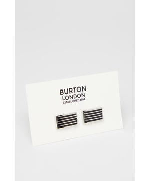 Sleek rectangular design with contrasting silver and black striped detailing
        Secure fastening mechanism for reliable wear throughout formal occasions
        Versatile size that complements both standard and French cuffs
        Polished metal finish that catches the light subtly
        Classic horizontal stripe pattern that adds visual interest without overwhelming
    
    These sophisticated rectangle cufflinks offer the perfect finishing touch to your formal attire. The timeless combination of silver with black striped detailing presents a refined aesthetic that works brilliantly with a range of shirt colours. Ideal for adding a subtle touch of personality to your suit ensemble without compromising on formality. Pair with a crisp white shirt and tailored Burton suit for important meetings or special occasions. These cufflinks transition effortlessly from daytime corporate events to evening functions, making them a versatile addition to your accessories collection. For a coordinated look, match with other silver-toned accessories such as a tie clip or watch. A practical yet stylish choice for the gentleman who appreciates classic design with contemporary appeal - perfect for weddings, business meetings, or any occasion where you want to display attention to detail.