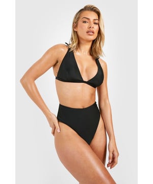 Plunging neckline for a daring look
        Tie shoulder straps for adjustable fit
        High-waisted bottoms for flattering silhouette
        Textured fabric adds visual interest
        Versatile two-piece design for mix-and-match styling
    
    Make a splash this summer with our alluring Tie Shoulder Plunge High Waist Bikini Set. This striking swimwear ensemble combines contemporary design with classic appeal, perfect for the fashion-forward beach-goer. The plunging neckline creates a bold statement, while the high-waisted bottoms offer a figure-flattering fit that exudes confidence. Adjustable tie shoulders allow for a customised fit, ensuring comfort throughout your sun-soaked adventures. Whether you're lounging by the pool, strolling along the shoreline, or embarking on a tropical getaway, this bikini set is your go-to choice for effortless style. Pair with oversized sunglasses and a wide-brimmed hat for ultimate beach chic, or layer with a sheer kaftan for elegant poolside glamour. Versatile and on-trend, this bikini set is an essential addition to your holiday wardrobe.