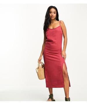 Petite by Vila Petite Do get caught wearing it twice Scoop neck Adjustable straps Front split Regular fitSold By: Asos