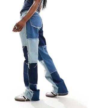 Jeans by Jaded London Denim that does the talking Boyfriend fit Patchwork design Mid rise Belt loops Five pockets Distressed finishSold By: Asos