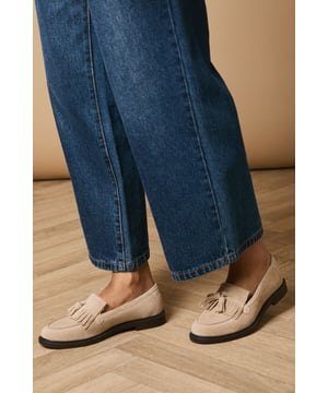 Crafted with soft suede material for everyday comfort
        Decorative tassel detail adds a playful feminine touch
        Classic loafer silhouette with a modern twist
        Flat heel height (under 2cm) ensures all-day wearability
        Durable synthetic outsole provides reliable grip
    
    The Brighton Suede Tassel Loafers from Oasis present the perfect blend of comfort and style for your casual wardrobe. These charming flats showcase delightful tassel detailing that brings character to any ensemble. Style them as seen with relaxed denim jeans and a crisp button-down shirt for an effortlessly chic daytime look. The versatile design makes these loafers ideal for family gatherings, weekend brunches, or casual office environments. Their comfortable flat design ensures you can navigate busy days with ease, whilst the classic silhouette offers timeless appeal that complements both trousers and dresses. Perfect for the woman who values both practicality and feminine details, these loafers will quickly become your go-to footwear for occasions that call for understated elegance with a playful twist.