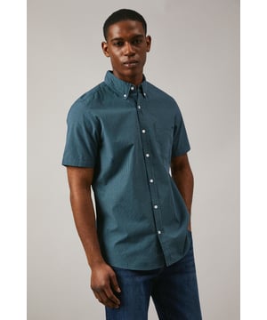 Classic button-down collar with traditional gingham check pattern
        Short sleeves with neat hem for warm-weather comfort
        Chest pocket detail adds functional style
        Back yoke with centre pleat for enhanced movement
        Regular fit silhouette suitable for various body types
    
    This Maine gingham check shirt combines timeless British style with everyday versatility. The woven fabric offers a structured yet comfortable feel, perfect for casual occasions that call for a touch of refinement. Style it as shown with dark denim jeans and white trainers for a relaxed weekend look, or pair with chino shorts and loafers for summer garden parties. The button-down collar maintains a neat appearance throughout the day, while the short sleeves make it ideal for family gatherings and casual outings during warmer months. This shirt transitions effortlessly from daytime casual to evening drinks, making it a wardrobe essential that works across multiple seasons. Layer under a lightweight jumper when temperatures drop or wear open over a plain t-shirt for a more contemporary approach to casual dressing.