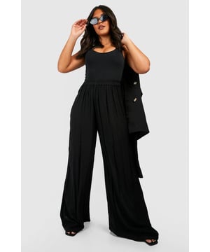 From top to bottom, we've got you covered with this season's perfect pair of plus size trousers. Figure flattering, practical, and an essential addition to your new-season wardrobe, this style is made with extra fabric to ensure the perfect fit. Team a pair of plus size wide leg trousers with a lace bodysuit and barely-there heels for style too good to go unnoticed. It doesn't matter if you're after simple or statement, our dedicated range of plus size pants has the key garms you need.Style: Wide Leg TrousersFabric: Cheesecloth