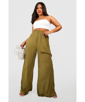 From top to bottom, we've got you covered with this season's perfect pair of plus size trousers. Figure flattering, practical, and an essential addition to your new-season wardrobe, this style is made with extra fabric to ensure the perfect fit. Team a pair of plus size wide leg trousers with a lace bodysuit and barely-there heels for style too good to go unnoticed. It doesn't matter if you're after simple or statement, our dedicated range of plus size pants has the key garms you need.Style: Wide Leg TrousersFabric: Cheesecloth