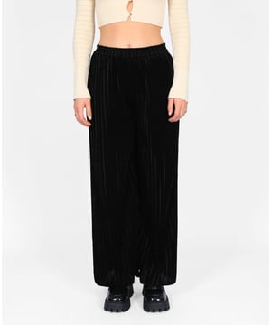 Cast a spell with the Witching Hour Velvet Trousers from Bolongaro Trevor. These pleated wide leg trousers are designed to elevate your style with their rich texture and dramatic silhouette.
Rich Pleated Velvet: The sumptuous velvet fabric, detailed with subtle pleating, brings depth and elegance to your outfit.
High Waist &  Wide Leg: Designed with a high waist and wide leg fit, these trousers create a flattering, elongated silhouette.
Practical Comfort: Elasticated waistband ensures a comfortable fit, while in-seam pockets add a practical touch.