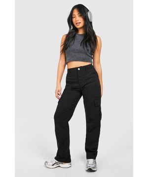 Loose-fit cargo jeans for a relaxed, on-trend look
        Multiple utility pockets for practicality and style
        High-waisted design for a flattering silhouette
        Wide leg cut for maximum comfort and movement
        100% cotton fabric for breathability and durability
    
    Embrace the utility trend with these petite cargo loose jeans from Boohoo. Perfect for the fashion-forward woman who values both style and comfort, these jeans offer a relaxed fit that's ideal for casual outings. The high-waisted design creates a sleek silhouette, while the wide leg cut ensures unrestricted movement. Style these versatile jeans with a cropped top and trainers for a laid-back daytime look, or dress them up with a fitted bodysuit and heeled boots for an evening out with friends. The multiple pockets add a functional edge, making these jeans suitable for various casual occasions, from shopping trips to family gatherings. The 100% cotton composition ensures breathability, making them a comfortable choice for all-day wear. These cargo jeans are a must-have addition to any trendsetter's wardrobe, offering endless styling possibilities for the modern, fashion-conscious woman.