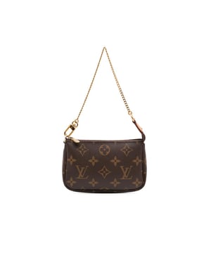 The Mini Pochette Accessoires features a monogram canvas body a chain link handle and a top zip closure.Brand: Louis VuittonCondition: Pre-lovedType: HandbagRating: B+Main Material: CanvasDimensions (LxWxD): 10.5x15x3Strap Drop: 17Comments: Exterior Back Creased. Exterior Back stained with Other. Practical Attachment Rusty/Tarnished Scratched. Exterior Top Split Worn. Exterior Top stained with Other. Zipper Rusty/Tarnished Scratched.