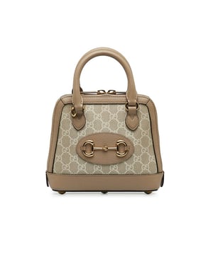 The Horsebit 1955 satchel features a coated canvas body with leather trim rolled leather handles a zip-around closure and interior zip and slip pockets.Brand: GucciCondition: Pre-lovedType: SatchelRating: B+Main Material: FabricDimensions (LxWxD): 17.5x20x7Handle Drop: 8.5Comments: Exterior Back Out Of Shape. Exterior Bottom Out Of Shape. Exterior Corners Worn. Exterior Front Discolored Out Of Shape. Exterior Front stained with Other. Exterior Handle Discolored Out Of Shape Scratched Worn. Interior Pocket stained with Pen Mark Other. Interior Lining Worn. Interior Lining stained with Other. Practical Attachment Scratched. Exterior Side Out Of Shape. Exterior Top Out Of Shape Scratched. Zipper Scratched.