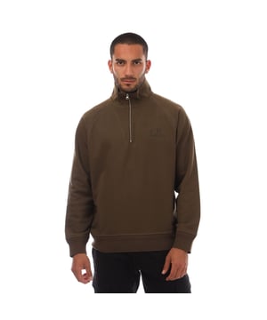Heren C.P. Company Diagonal Raised Fleece Half Zipped Sweatshirt in groen.- Opstaande kraag.- Halve rits sluiting.- Contrasterende stiksels bij de armsgaten.- Geborduurd logo op de borst.- Geribbelde boorden en onderzoom.- Regular fit.- 100% Katoen.- Ref: 18CMSS043A683