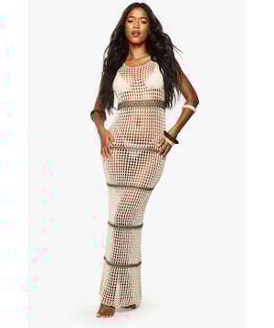 Super-soft crochet maxi dress with distinctive horizontal stripe detailing
        Figure-hugging silhouette with floor-length design for maximum impact
        Open-knit texture creates a stylish layered look perfect for beach settings
        Sleeveless cut with scoop neckline for a flattering summer profile
        Horizontal banding creates visual interest and structure throughout the dress
    
    This striking crochet maxi dress combines bohemian charm with contemporary styling, making it an essential addition to your holiday wardrobe. The intricate open-knit design offers a relaxed beach aesthetic whilst the body-contouring fit ensures you maintain a feminine silhouette. Style with a simple bandeau underneath and pair with metallic accessories as seen on our model for daytime beach glamour. For evening beachside dining, layer over a slip dress and add strappy sandals with stacked bangles. This versatile piece transitions effortlessly from poolside lounging to casual sunset gatherings, embodying the carefree spirit of summer whilst keeping you looking effortlessly chic. Perfect for packing in your suitcase, this Boohoo statement piece will become your go-to for warm-weather getaways.