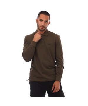 Heren C.P. Company Stretch Piquet Poloshirt met Lange Mouwen in groen. - Geribbelde polokraag. - Twee knoopsluitingen. - Lange mouwen met geribbelde manchetten. - Borduring op de borst. - Zijsplitten. - Regular fit. - 95% Katoen, 5% Elastaan. - Ref: 18CMPL061A683