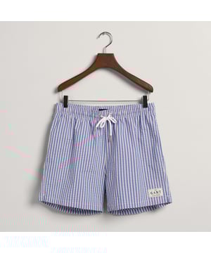 Made for a regular fit  they have a mid-length cut and a regular waist  featuring an elasticated waistband with a contrast drawstring. These shorts are equipped with side seam pockets  a single back pocket  and our classic GANT logo embroidered on the leg.