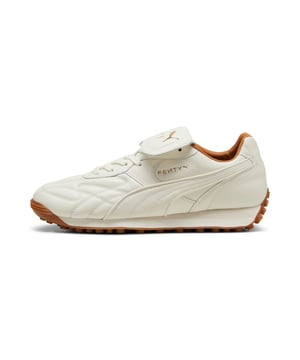 PRODUCT STORY: The newest FENTY x PUMA Avanti by Rihanna is reinvented with premium leather, touches of gold, and retro gum soles. Inspired by football legends, this Avanti is worn by Romeo Beckham and many others in the latest FENTY x PUMA campaign. DETAILS: Soft leather upper; Attached fold-over tongue in soft leather; Lace closure; Brown leather lining; EVA foam wedge midsole; Gum outsole; FENTY x PUMA co-branding details.