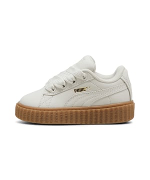 PRODUCT STORY: Rihanna and PUMA get down to earth with the Creeper Phatty Earth Tone. Made with luxe, high-quality nubuck, the new FENTY x PUMA Creeper Phatty stands out while blending in with soft, natural colors. Touches of gold and the classic Creeper sole elevate this new drop from Rihanna. DETAILS: Leather upper; Lace closure; Ribbed gum midsole; Gum outsole; PUMA branding details.
