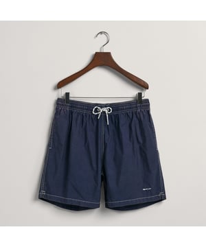 Made for a regular fit  they have a mid-length cut and a regular waist  featuring an elasticated waistband with a contrast drawstring. These shorts are equipped with side seam pockets  a single back pocket  and our iconic shield logo embroidered on the leg.
