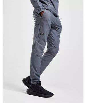 The Under Armour UA Storm Vanish Track Pants are designed to deliver superior performance, comfort, and durability. Made from a premium blend of 87% polyester and 13% elastane, these lightweight and flexible pants provide excellent mobility. Featuring UA Storm technology, they repel water while still allowing breathability, making them ideal for workouts, outdoor activities, or casual wear. Enjoy a perfect balance of functionality and style with these versatile track pants.