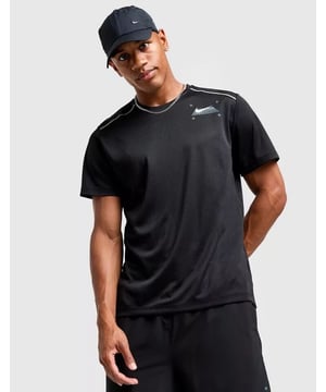 The Nike Miler Graphic T-Shirt is a lightweight, recycled polyester tee designed for runners and active use. It features Dri-FIT moisture-wicking, reflective shoulder panels for visibility, and a bold back graphic. With a relaxed fit and easy care, it offers style and performance for workouts and high-intensity activities.