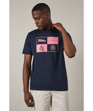 Crafted from soft cotton jersey for all-day comfort
        Features a distinctive sailing crest graphic print in contrasting hues
        Classic crew neck design with short sleeves for a timeless silhouette
        Straight hem with clean finishing for a polished appearance
        Part of the Maine collection, reflecting nautical heritage and style
    
    This Maine Sailing Crest Print T-shirt combines casual comfort with maritime charm. The striking quadrant design showcases nautical motifs including a sailing boat and crest emblem, perfect for adding character to your weekend wardrobe. Style as seen on our model with light-coloured shorts and crisp white trainers for an effortless summer look that works brilliantly for coastal walks or casual gatherings. For cooler evenings, layer under a lightweight bomber jacket or unstructured blazer. The versatile design transitions seamlessly from daytime outings to relaxed evening socials, making it an essential addition to your casual collection. Machine washable at 30 degrees, this t-shirt maintains its shape and graphic detail with proper care.