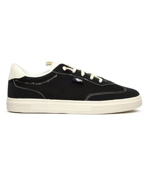 Zapatillas Rocket Dog Zap negras para mujer, confeccionadas en textil y suela de goma. Incluyen: sistema de cordones elásticos, cuello de toalla y plantilla de espuma afelpada.
