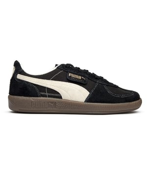 Zwarte Puma Palermo Vintage sneakers voor heren, gemaakt van textiel en een rubberen zool. Voorzien van: Puma-merk, suède details en een zachte hielkap.