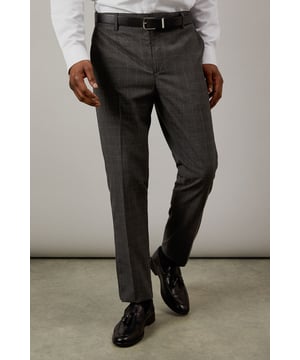 Classic Prince of Wales check pattern adds sophisticated visual interest
        Slim fit design offers a modern, streamlined silhouette
        Clean front styling with side pockets for practicality
        Back pockets with button closure for secure storage
        Versatile charcoal tone perfect for year-round wear
    
    These Burton slim fit trousers showcase timeless British tailoring with a contemporary edge. The distinctive Prince of Wales check pattern presents a refined aesthetic that works brilliantly for smart occasions whilst maintaining versatility. Style them as seen with a crisp white shirt and polished black leather shoes for business meetings or important presentations. For smart-casual events, pair with a fine merino wool jumper and Chelsea boots. The slim cut through the seat and thigh creates a sharp silhouette without sacrificing comfort, making these trousers ideal for long days at the office or evening gatherings at upmarket venues. Perfect for the man who appreciates classic style with modern proportions, these trousers will become a cornerstone of your smart wardrobe, transitioning effortlessly from boardroom to bar.