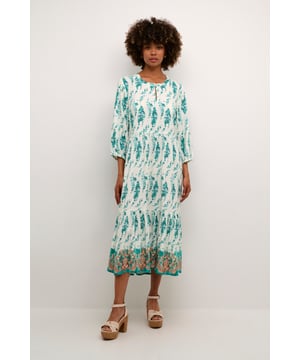 Kim,A-shape,Midi lengte,3/4 mouwen  Fijne was 30°, niet bleken, niet in de droger drogen, Druipnat ophangen in de schaduw, koud strijken max. 110° C,   100% Viscose (LENZING™ ECOVERO™)