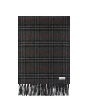 Wrap yourself in luxury with our Burberry checked Reversible Black Cashmere Scarf. Made with 100% cashmere, it's incredibly soft and warm, perfect for keeping you cozy on chilly days. Its timeless vintage check pattern adds a touch of sophistication to any outfit. With a generous size of 160x30cm, it can be styled in a variety of ways, making it a versatile and must-have accessory for any wardrobe. Elevate your style and stay warm with our Burberry cashmere scarf