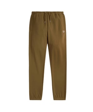 Veredeln Sie Ihre Freizeitgarderobe mit der Fred Perry Loopback Sweatpant in P96 Shaded Stone Brown. Diese hochwertige Herren-Jogginghose vereint zeitlosen britischen Stil mit außergewöhnlichem Komfort und besticht durch die charakteristische Loopback-Baumwollkonstruktion, für die Fred Perry bekannt ist. Die edle Farbgebung in Shaded Stone Brown bietet vielseitige Styling-Optionen für entspannte Wochenenden und einen aktiven Lebensstil. Mit Liebe zum Detail gefertigt, bietet diese Jogginghose die perfekte Balance aus sportlichem Erbe und modernem Stil, die treue Fred Perry-Fans erwarten. 100 % Baumwolle