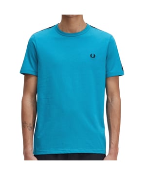 Experience the iconic Fred Perry T-Shirt in striking Cyber Blue with black contrast tape ringer detailing. This men's fashion essential combines bold style with premium craftsmanship, making it a must-have addition to your wardrobe. Imported from China with Fred Perry's signature attention to quality. 100% Cotton