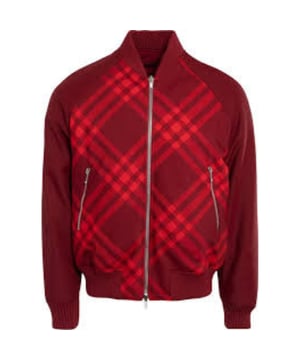 Experience style and functionality with the Burberry Reversible Check-Print Bomber Jacket. Featuring a full zip fastening, 2 pockets with zip closure, and elasticated cuffs, this jacket is designed to keep you comfortable and fashionable. Plus, with 2 inside pockets with button fastening, you'll have plenty of secure storage for your essentials. Made with high-quality polyamide, this bomber jacket offers durability and style in one must-have piece. Don't settle for ordinary outerwear - upgrade your wardrobe with the Burberry Reversible Check-Print Bomber Jacket today!