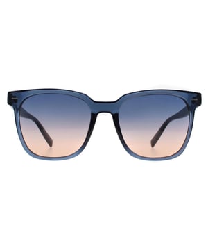 Elevate your style with these exquisite Calvin Klein sunglasses featuring a stunning crystal navy frame complemented by navy/peach gradient lenses. Meticulously crafted with premium 55X19X145 dimensions, these designer sunglasses deliver both sophisticated protection and fashion-forward appeal. 100% Plastic