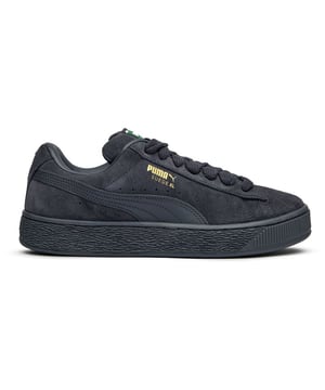 Zapatillas Puma Suede XL para hombre, grises, fabricadas en ante y con suela de goma. Presentan: diseño XL, lengüeta acolchada, cordones gruesos y cordones de repuesto.