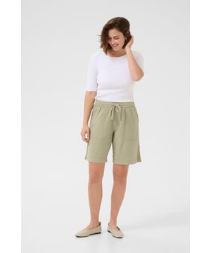 Casual fit,Taille lengte  Wassen op 30°, niet bleken, drogen in droger behoedzaam, Druipnat ophangen in de schaduw, warm strijken max. 150° C,   100% Katoen