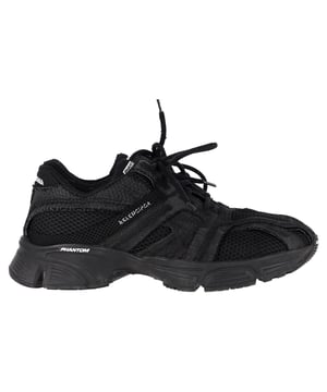 VINTAGE, RRP AS NEW
Balenciaga’s Phantom Low Top Sneakers channel a bold, athletic aesthetic with a fashion-forward twist. Crafted in Italy, they feature a black paneled mesh design, signature logo accents, and a chunky silhouette that defines street-style cool. Comfortable yet striking, they’re the ultimate go-to for elevated off-duty looks.


Balenciaga Phantom Low Top Sneakers in Black Polyamide	
Condition: Good
Signs of wear: Minor markings, Lightly used but very well maintained. Minor mark at soles & creasing, light scuffing at the soles and heels.
Packaging: None
Color: Black
Material: Polyamide
Size: EU | 43
Measurements: Heel height: 50; Insole length: 330
SKU: MRPPUGBSH488158M