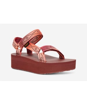 Teva Flatform Universal sandalen hebben een zachte en comfortabele plateauzool die perfect is voor dagelijks gebruik. Deze sandalen hebben een bovenwerk van textielbanden en een verstelbare enkelband.