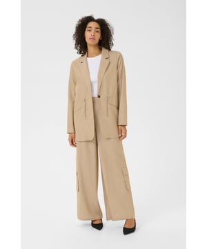 Loose fit,Elastische taille,Taille lengte,Lange mouwen  Fijne was 30°, niet bleken, niet in de droger drogen, Druipnat ophangen in de schaduw, koud strijken max. 110° C, Droogreiniging  65% Polyester,32% Viscose,3% Elastaan
